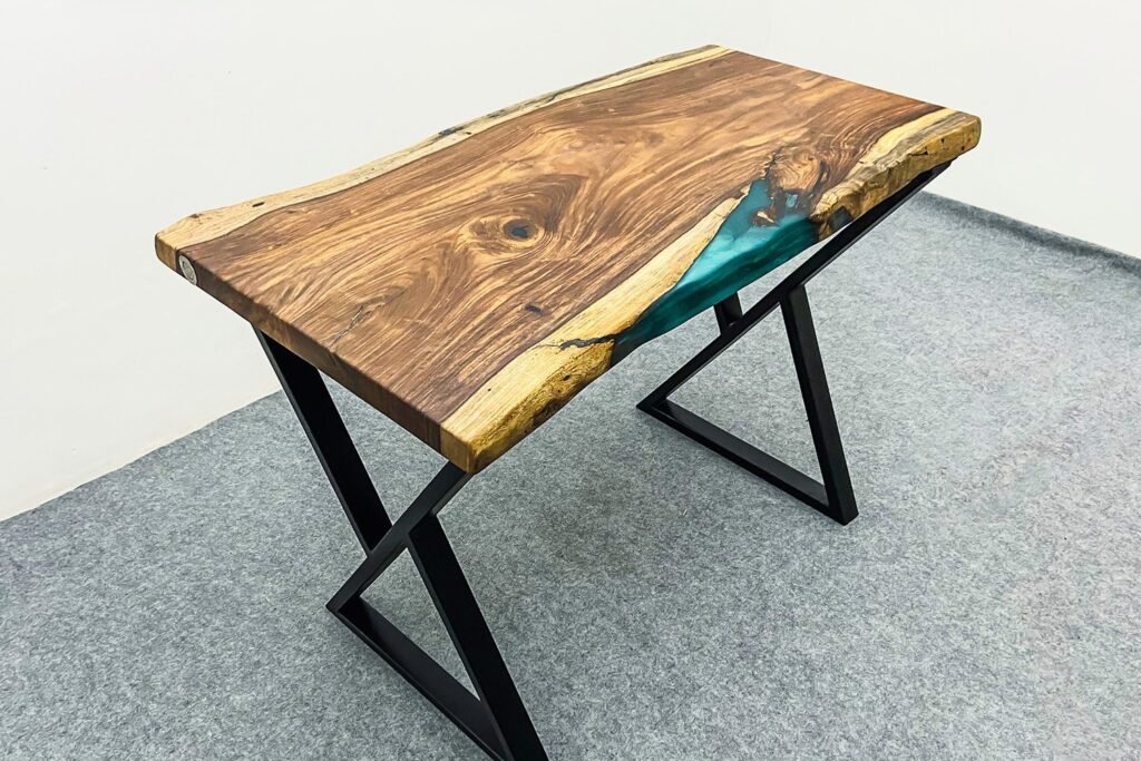 Live-edge resin wood study desk with a modern black metal frame—ideal for stylish home and office workspaces.